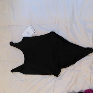 Naked Wardrobe Resting Beach face tank monokini